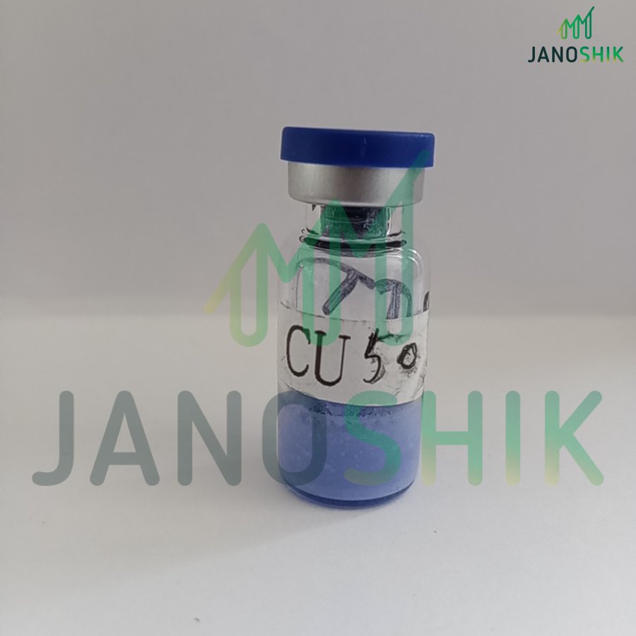 A vial of GHK-Cu 50 mg containing a distinctly blue powder, photographed for a laboratory test report